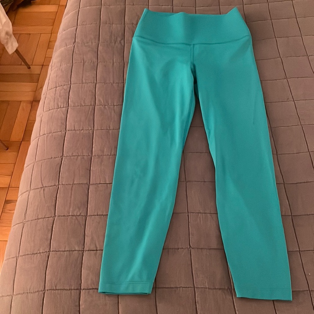 Carbon 38 Teal leggings- size small